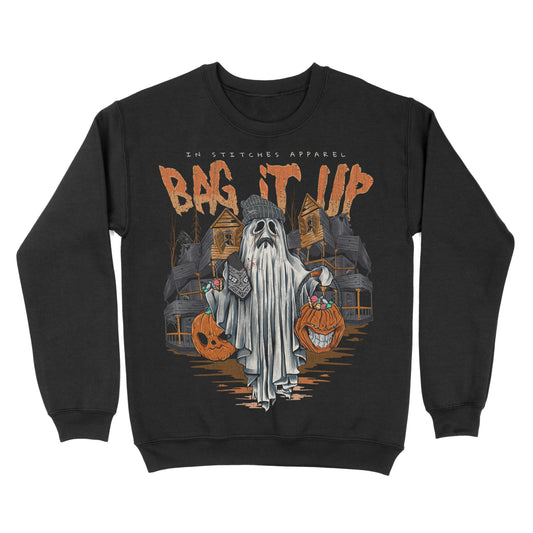 Black crewneck sweatshirt shown from the back, featuring a ghost holding jack-o’-lanterns with orange text reading “Bag It Up.”