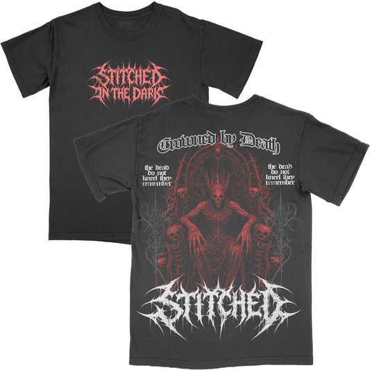 Front and back views of a black vintage-wash Crowned by Death graphic tee. The front features a red Stitched in the Dark metal-style logo, while the back features an oversized red skeletal throne illustration with “Crowned by Death” and white Stitched branding.