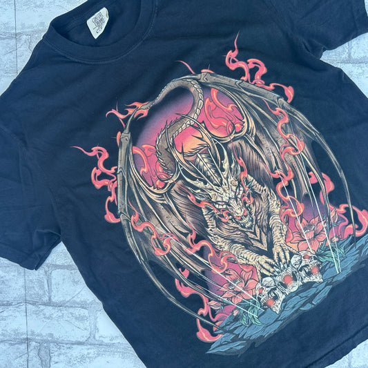 A black graphic tee with a vibrant illustration of a dragon in flames.