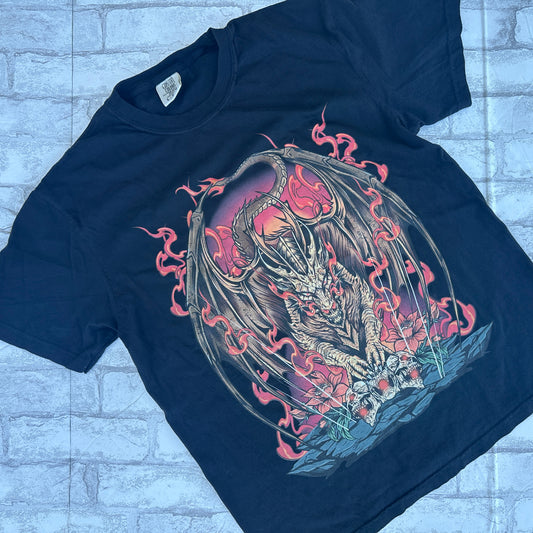 A black graphic tee with a vibrant illustration of a dragon in flames.