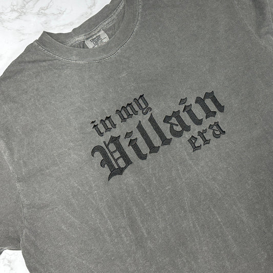 Pepper t-shirt with black gothic text reading “in my villain era” across the front.