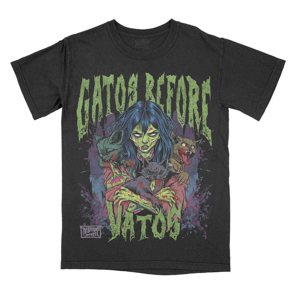A black graphic tee with the text 'Gatos Before Vatos' and an image of a woman and cats printed on the front.
