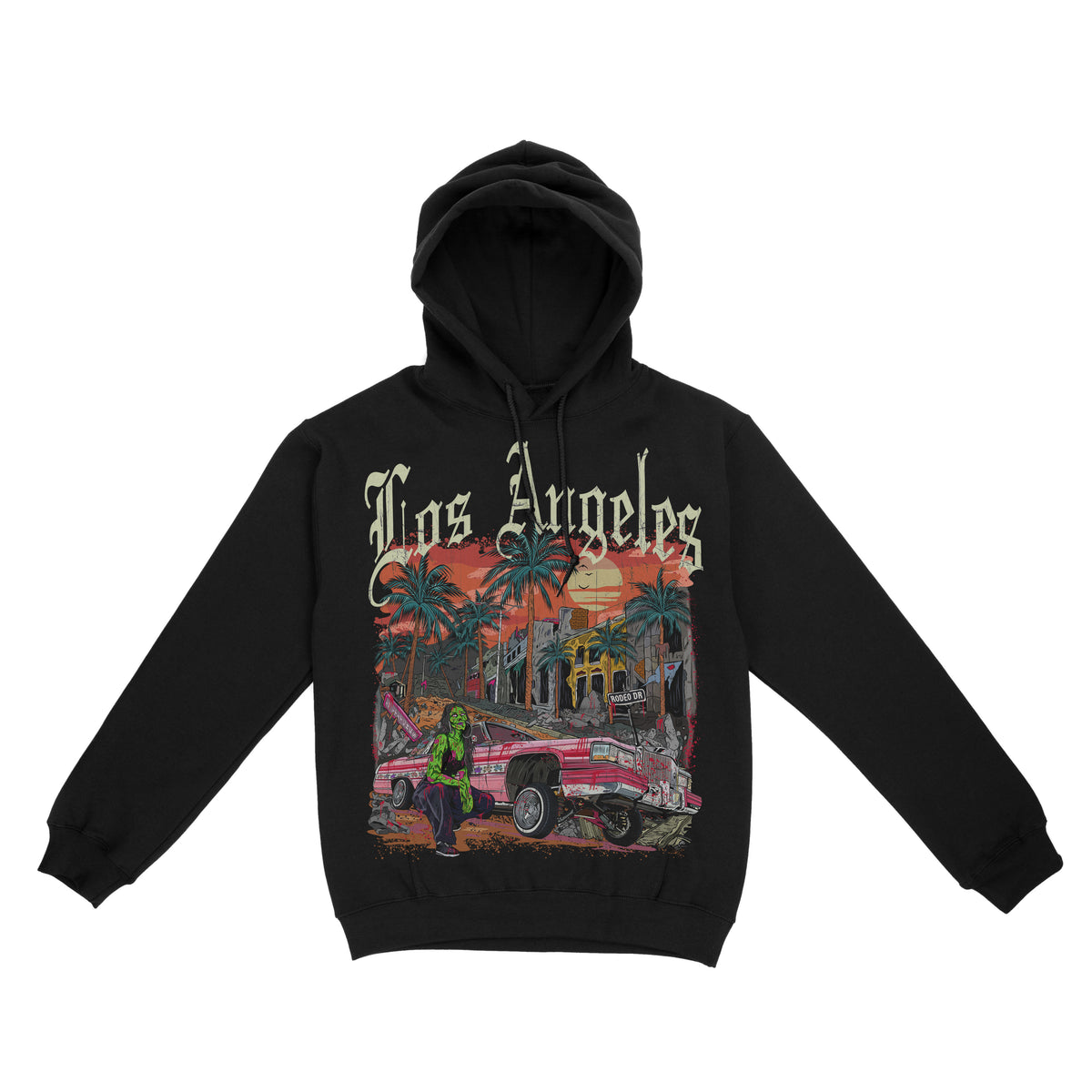 Black pullover hoodie featuring the phrase ‘Los Angeles’ above a colorful illustration of palm trees, a lowrider car, and a sunset city scene. Zombie girl models by car
