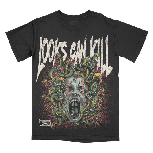 A black graphic tee with a design featuring a medusa character with multiple snakes as hair and stylized text saying 'LOOKS CAN KILL'.
