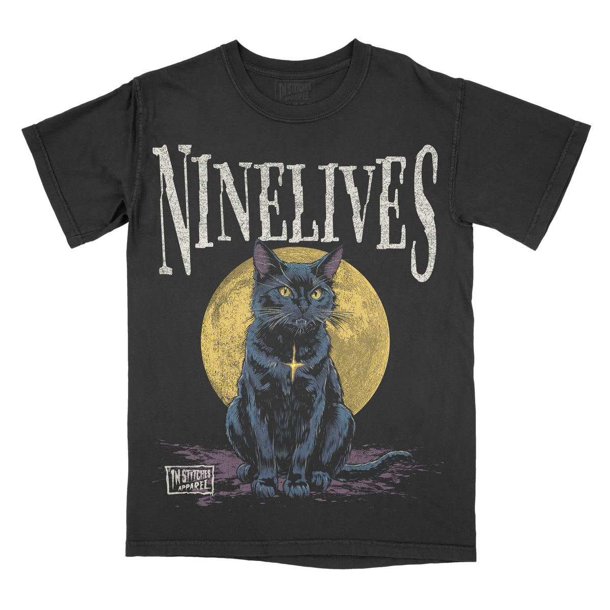Black graphic t-shirt featuring the word “Ninelives” above an illustration of a blue cat sitting in front of a yellow moon with a distressed, gothic-style design.