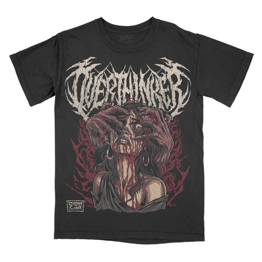 black T-shirt featuring a dark horror illustration of a monstrous woman pulling at her face, surrounded by deep red details, with distressed metal-style text reading “OVERTHINKER” and Stitched in the Dark branding.