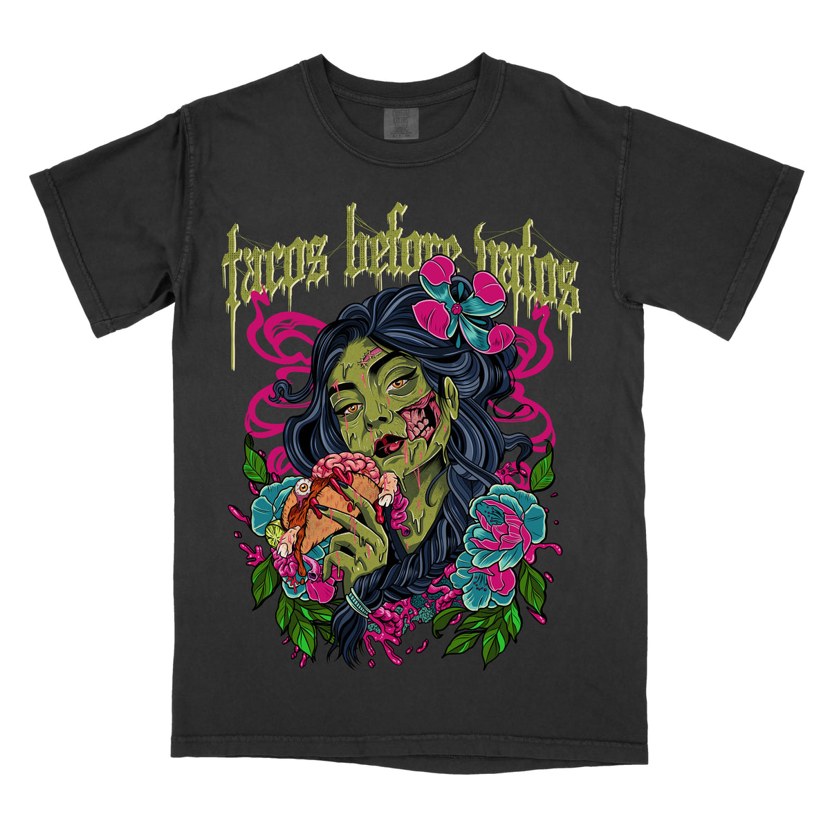Black t-shirt with the phrase ‘Tacos Before Vatos’ above a colorful gothic illustration of a woman holding a taco surrounded by flowers