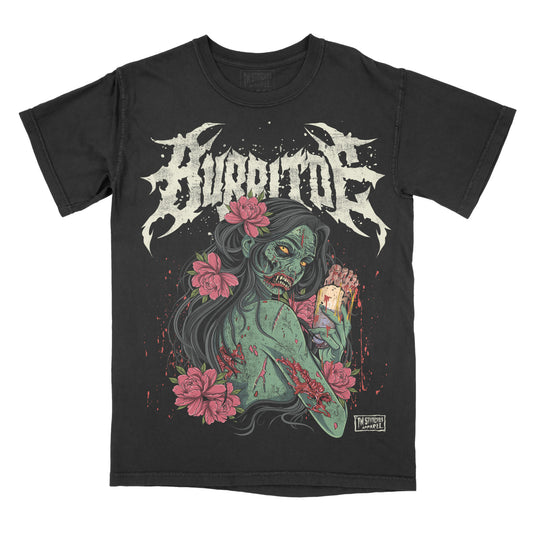 Black vintage-wash graphic T-shirt featuring a zombie girl with long black hair and pink flowers, holding a burrito with a human foot sticking out. The word "BURRITOE" appears above in a distressed metal-inspired font. Bold horror parody design with gore, floral accents, and gothic alternative style.