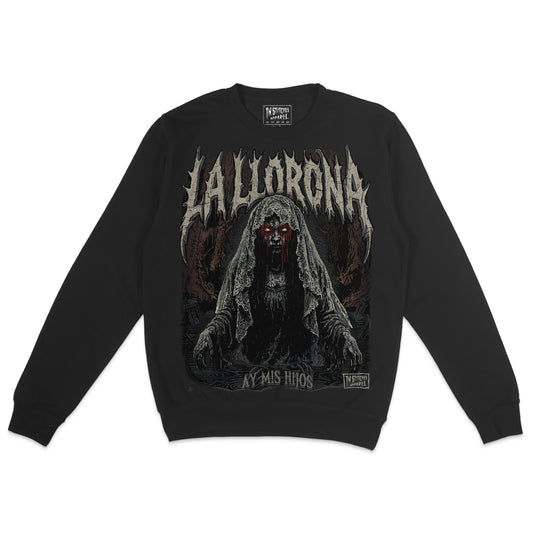Black crewneck sweatshirt featuring a dark La Llorona horror graphic with a veiled ghostly woman, glowing eyes, and distressed gothic lettering.