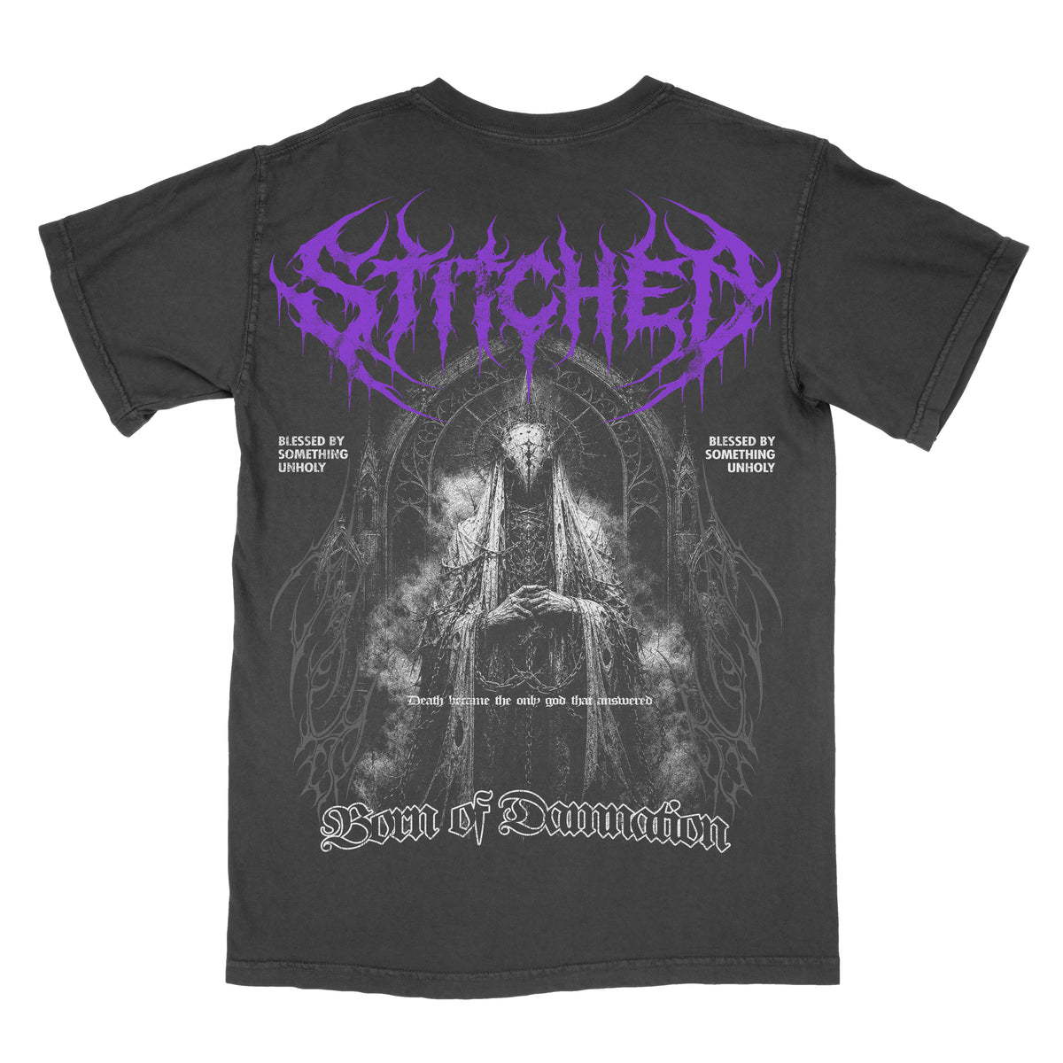 Back of a black vintage-wash Born of Damnation graphic tee featuring a large dark gothic figure framed by cathedral-inspired details, purple Stitched lettering, “Blessed by Something Unholy” text, and “Born of Damnation” across the bottom.