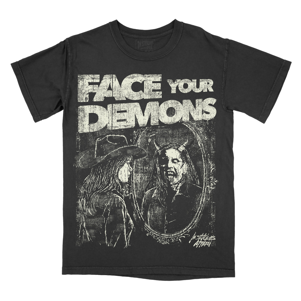 A black short-sleeve graphic t-shirt featuring the distressed white text 'FACE YOUR DEMONS' above a dark illustration of a horned figure in an oval mirror reflection, shown on a plain white background.