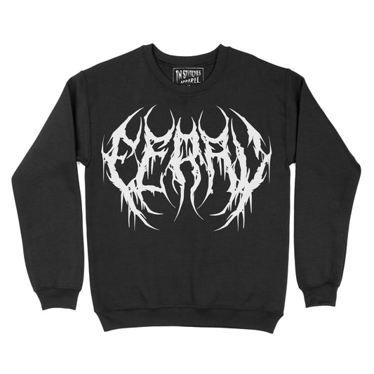 Black crewneck featuring white metal-style text reading “feral” across the chest.