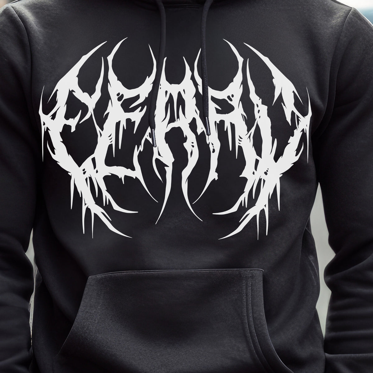 Black hoodie featuring white metal-style text reading “feral” across the chest.