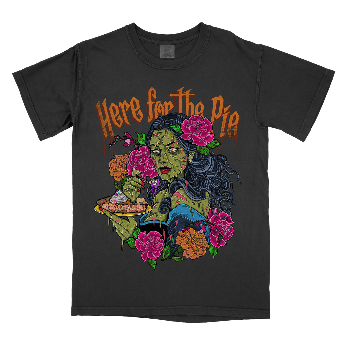 Black t-shirt with a graphic print of a zombie character eating a pie, surrounded by floral elements and the text 'HERE FOR THE PIE'.