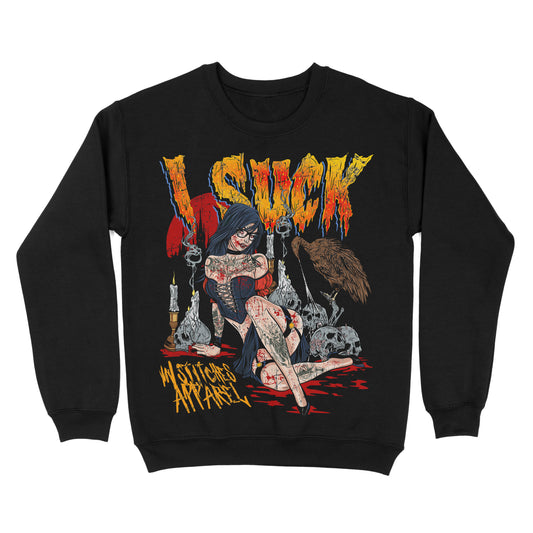Black sweatshirt featuring a horror-inspired illustration of a seated woman surrounded by candles and skulls, with the words ‘I Suck’ in distressed lettering and a vampire-themed gothic design.
