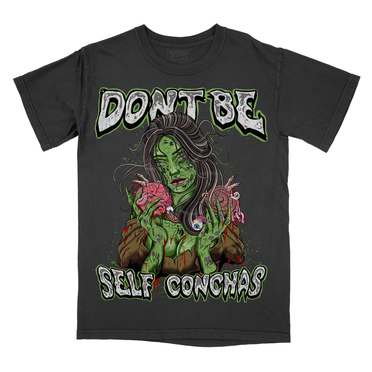Front view of a black graphic T-shirt featuring green illustrated artwork and text reading “Don’t Be Self Conchas.”