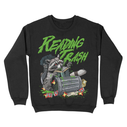 Black crewneck sweatshirt featuring a raccoon digging through a trash can with green text reading “Reading Trash.”