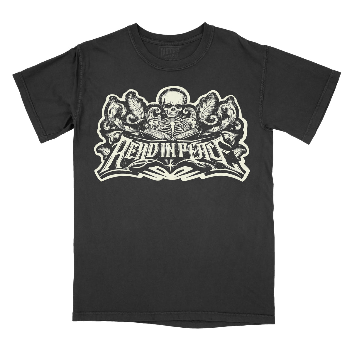 A black short-sleeve t-shirt with a large cream-colored graphic on the front featuring a skull, ornate scrollwork, and the text 'READ IN PEACE'.