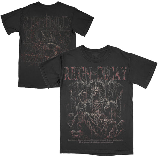 Front and back views of a black vintage-wash Reign of Decay graphic tee featuring a skeletal crowned figure on a gothic throne on the front and an oversized Stitched in the Dark graphic on the back.