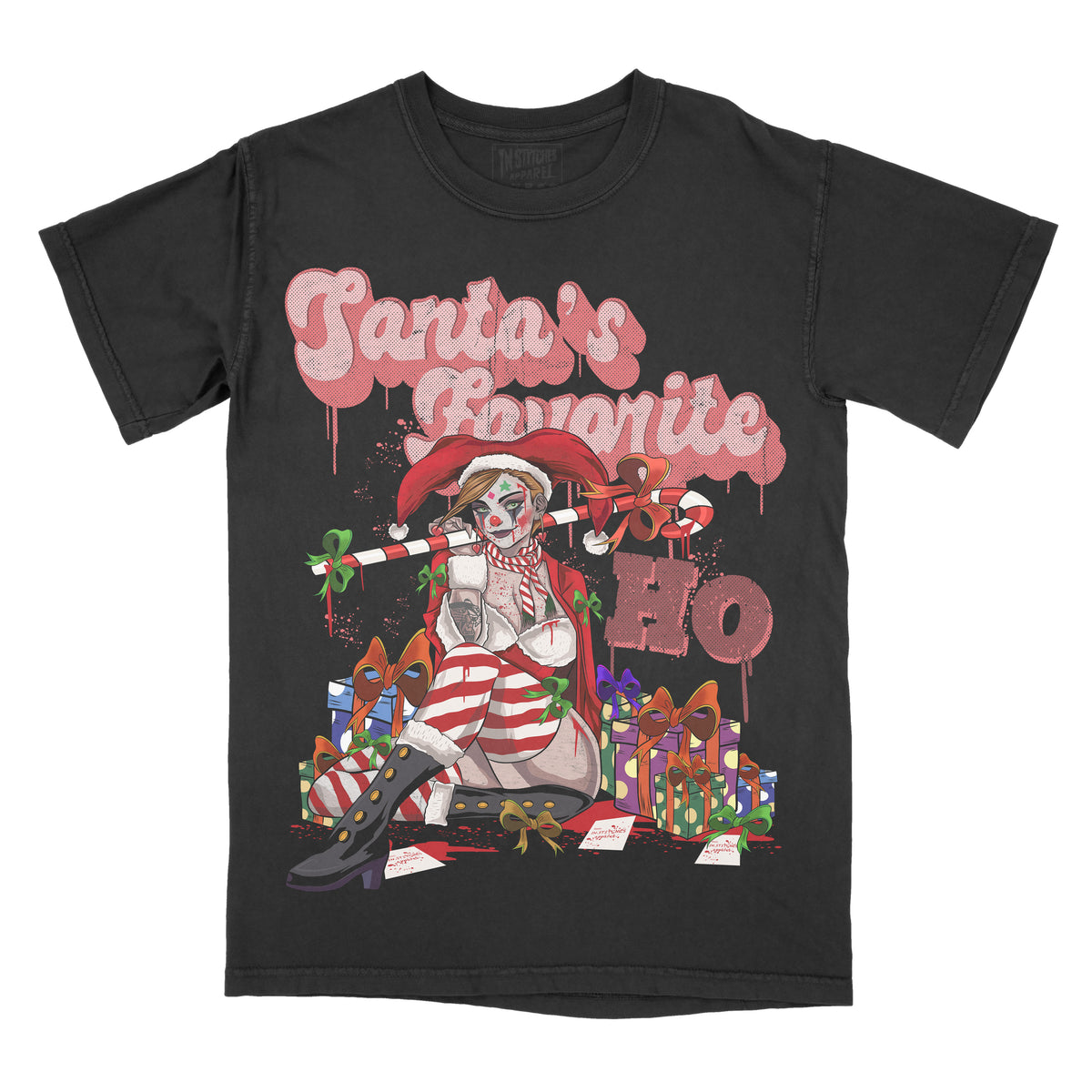 Black graphic t-shirt featuring the phrase “Santa’s Favorite Ho” in dripping pink lettering above an illustrated gothic Santa-style character surrounded by wrapped gifts and holiday-themed details.
