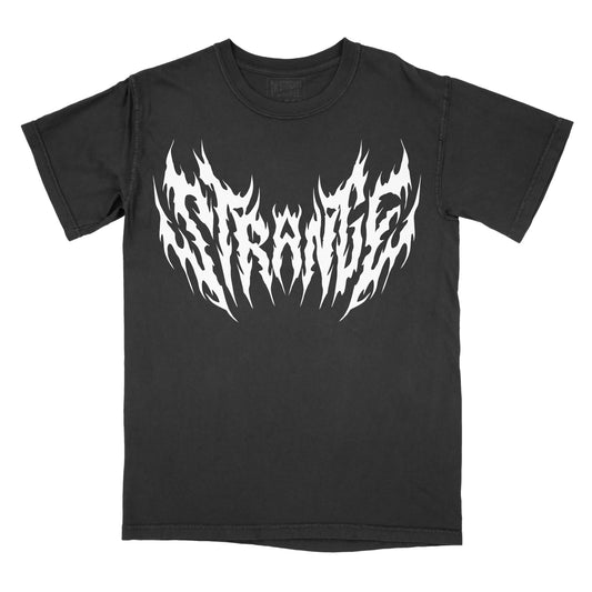 Black vintage-wash graphic T-shirt featuring the word "STRANGE" in a bold white metal-inspired font with sharp flame-like edges and symmetrical black metal logo styling