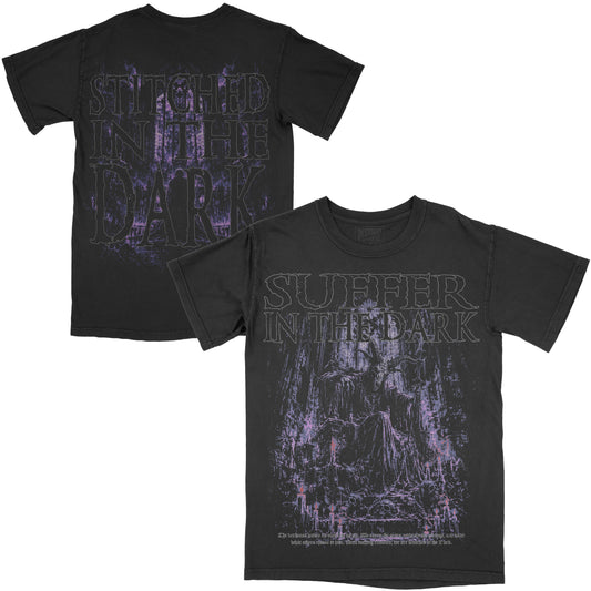 Front and back views of a black vintage-wash Suffer in the Dark graphic tee featuring a dark seated figure in a haunting purple forest on the front and oversized Stitched in the Dark artwork on the back.