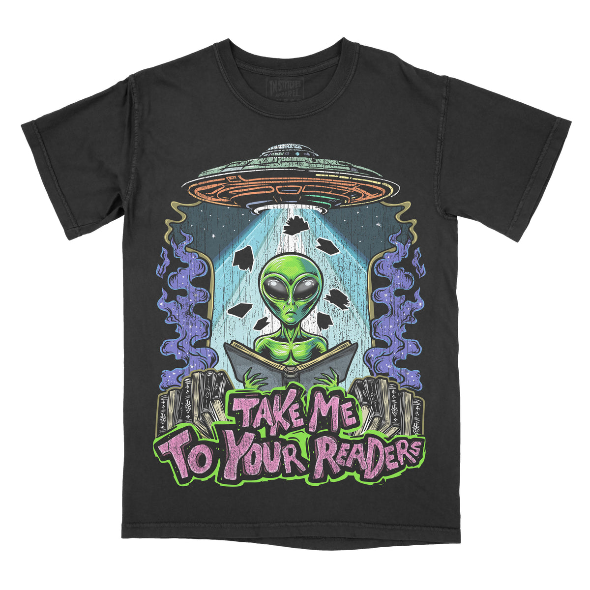 A black graphic tee with a design featuring an alien in a spaceship with the text 'Take Me To Your Readers'.
