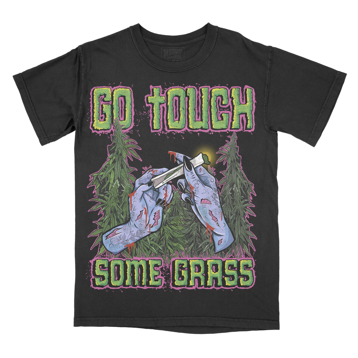 Black graphic t-shirt featuring the phrase “Go Touch Some Grass” with illustrated hands holding scissors cutting cannabis leaves in a distressed, colorful design.