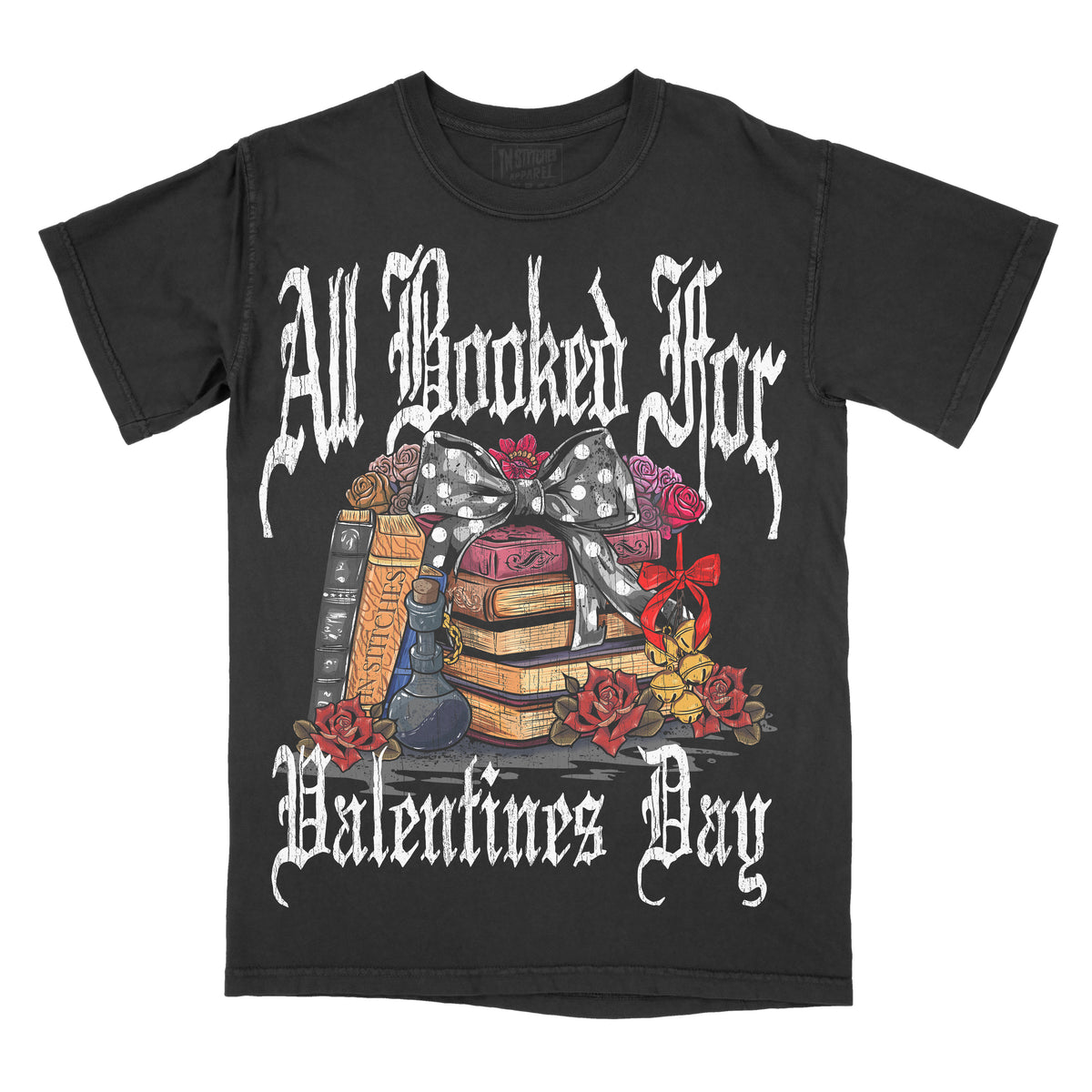 Black graphic tee with 'All Booked For Valentine's Day' text and book-themed illustrations including a bow, flowers, and a shelf of books.